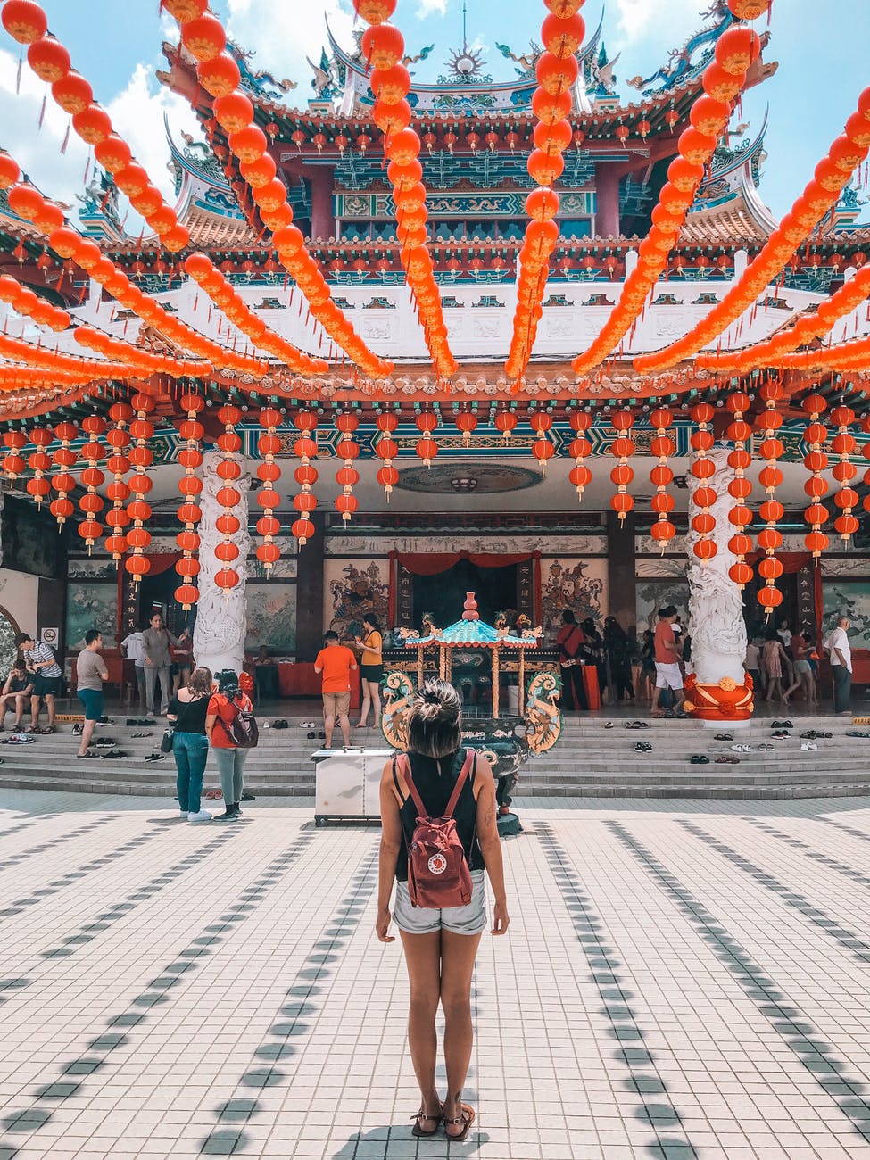 woman standing in front of building